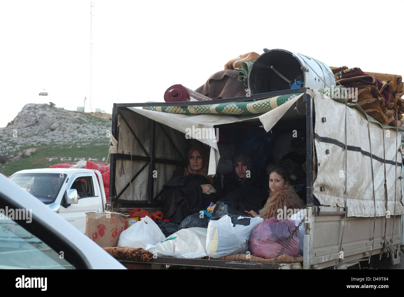 Flüchtlinge an der syrisch-türkischen Grenzübergang, Afrin, Syrien Stockfoto