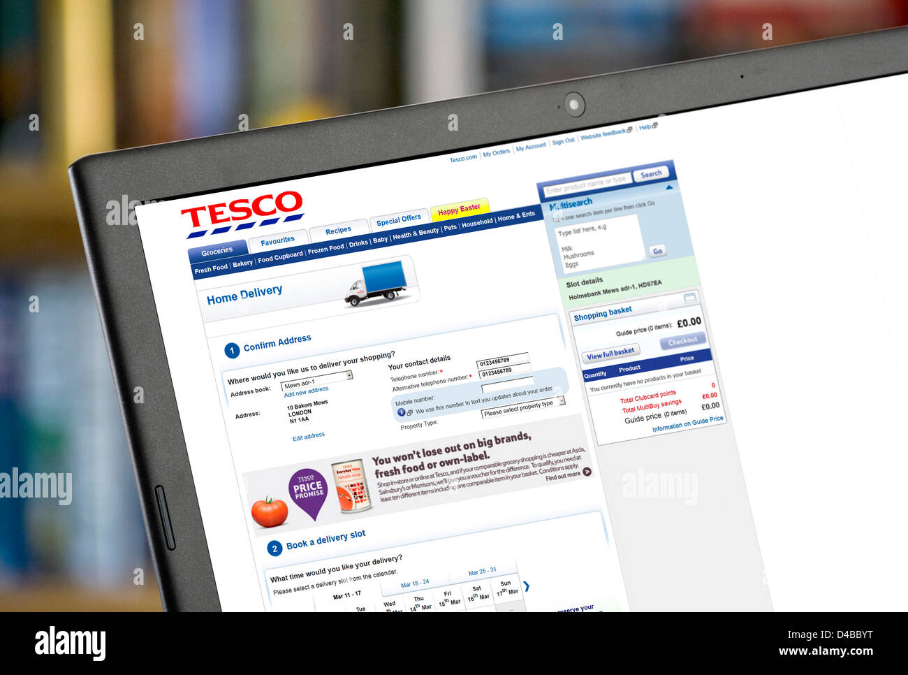 Buchen Sie eine Hauszustellung online Tesco-shopping-Website, UK Stockfoto