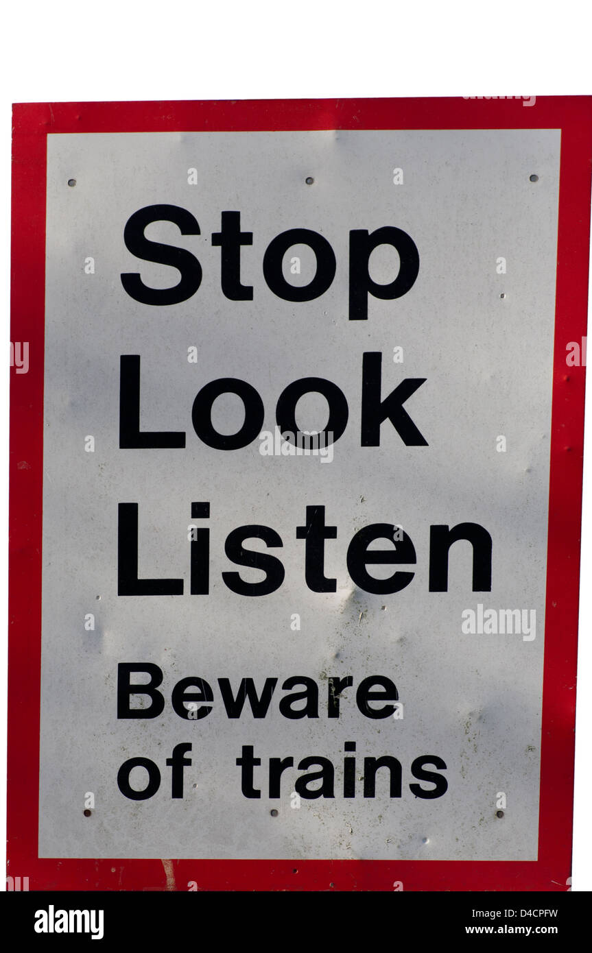 Stop Look hören Vorsicht Züge Zeichen auf eine unbemannte Bahnübergang Stockfoto