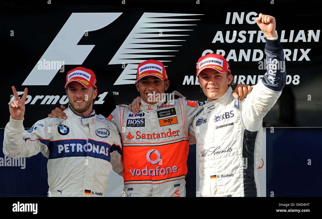 Britische Formel1-Fahrer Lewis Hamilton (C) of McLaren Mercedes, deutsche Nick Heidfeld (L) des BMW Sauber Team und Deutsche Nico Rosberg (R) von Williams feiern auf dem Podium nach dem Formel 1 Australian Grand Prix im Albert Park Circuit in Melbourne, Australien, 16. März 2008. Hamilton gewann, zweiter Heidfeld und Rosberg Dritter. Foto: GERO BRELOER Stockfoto