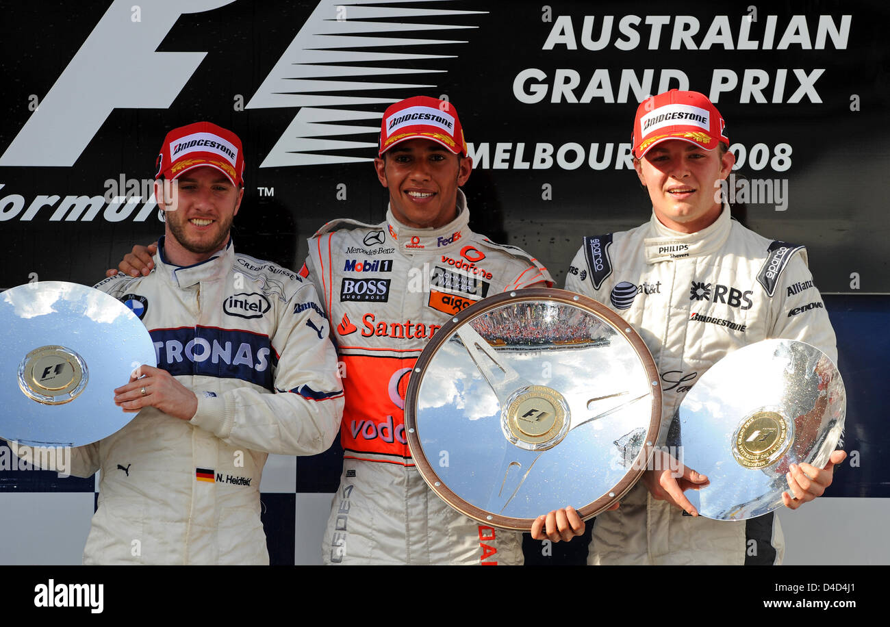 Britische Formel1-Fahrer Lewis Hamilton (C) of McLaren-Mercedes, deutsche Nick Heidfeld (L) des BMW Sauber Team und Deutsche Nico Rosberg (R) von Williams sind auf dem Podium nach dem Formel 1 Australian Grand Prix im Albert Park Circuit in Melbourne, Australien, 16. März 2008 abgebildet. Hamilton gewann, zweiter Heidfeld und Rosberg Dritter. Foto: GERO BRELOER Stockfoto