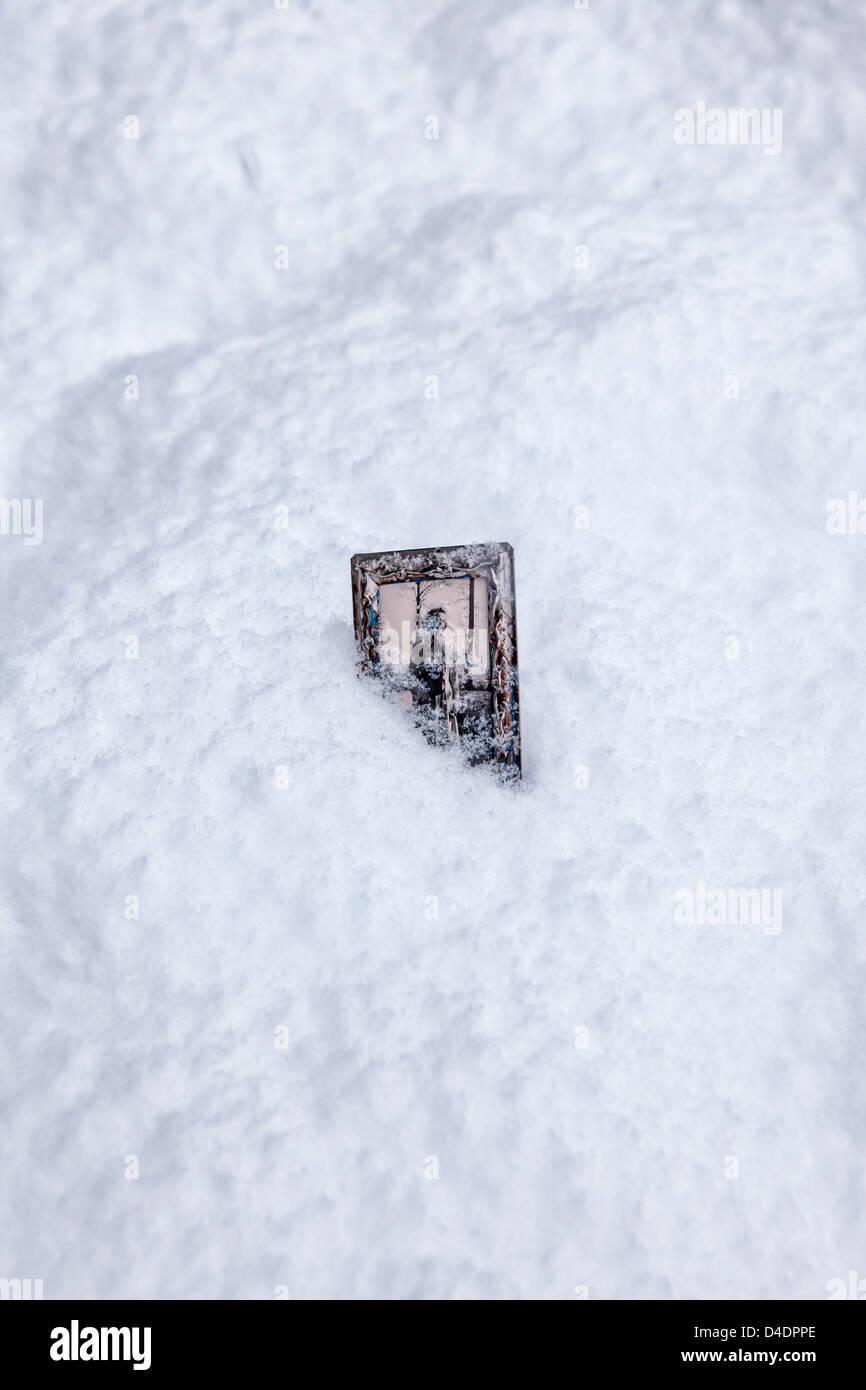 eine schneebedeckte altes Foto in einen Bilderrahmen Stockfoto