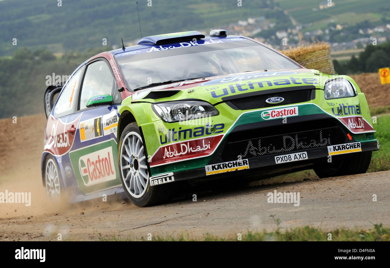 Finnische Jari-Matti Latvala und seinem Co-pilot Miikka Anttila in Aktion in ihrem Ford Focus RS WRC während "Shake Down" der ADAC Rallye Deutschland in Mesenich in der Nähe von Trier, Deutschland, 14. August 2008 gesehen. "Rallye Deutschland" verfügt über 19 Legs bis Sonntag, 17. August 2008. Foto: HARALD TITTEL Stockfoto