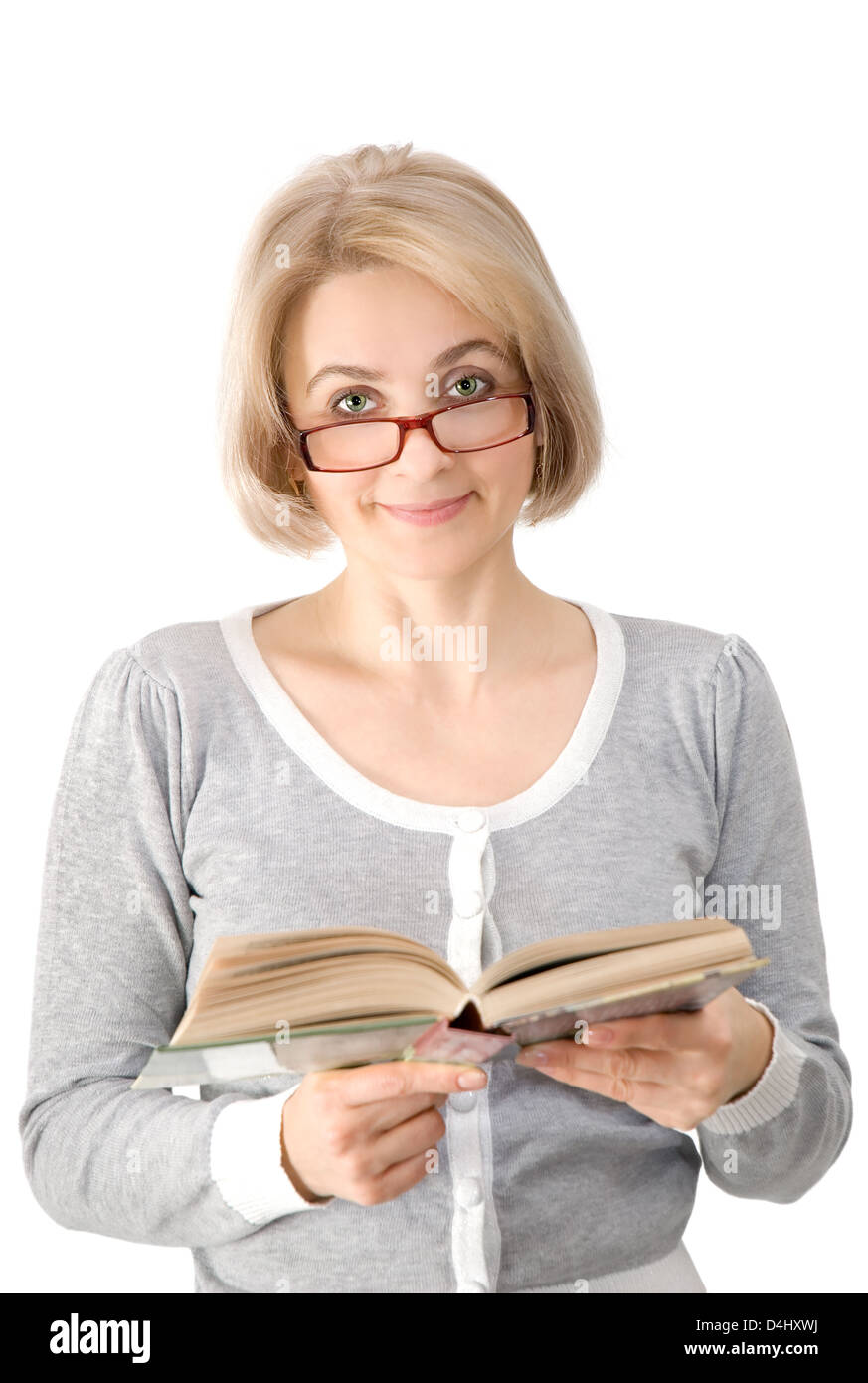 Die schöne junge Frau in Gläsern mit dem Buch Stockfoto