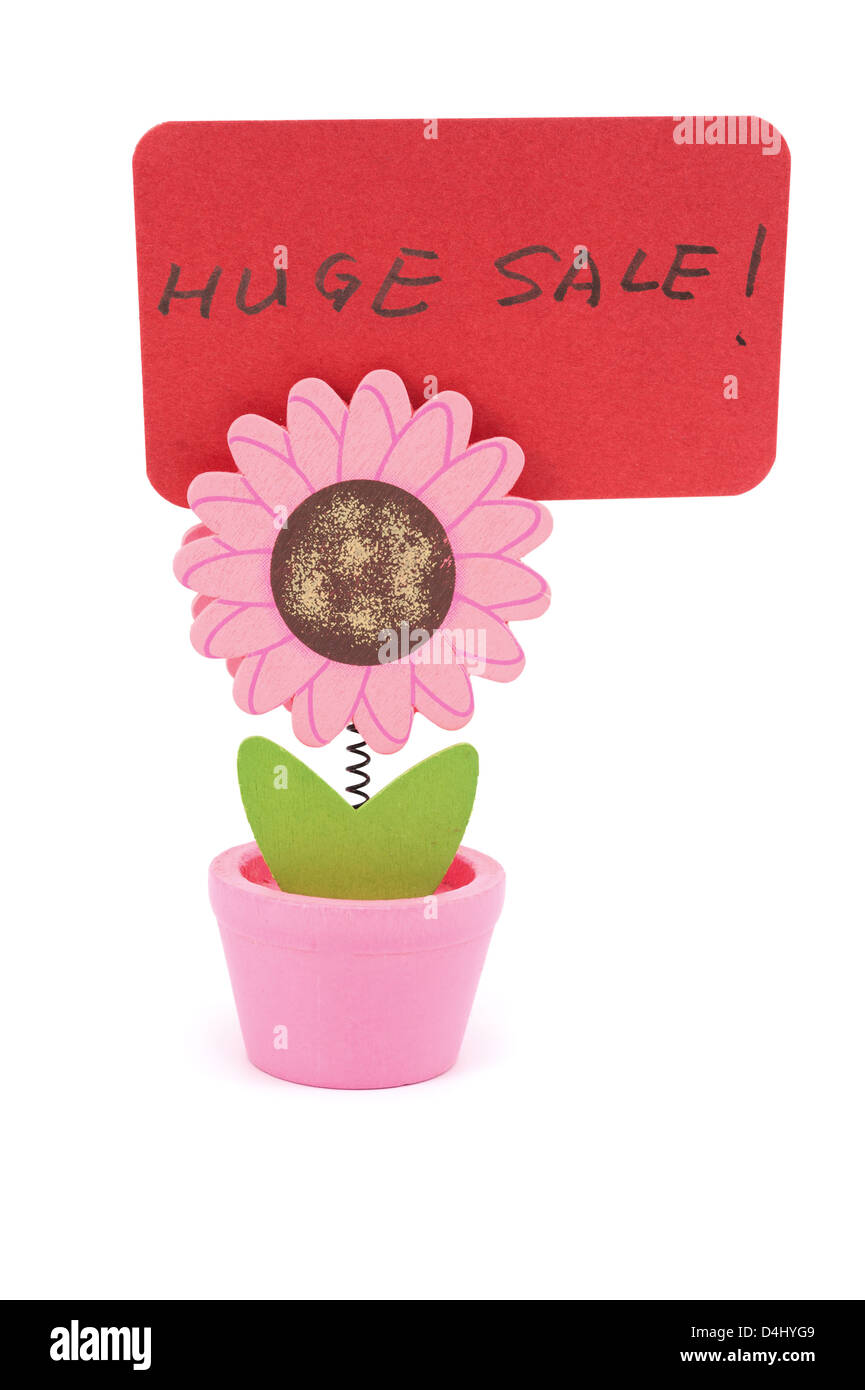 Riesige Verkauf Worte geschrieben auf rotem Papier Sonne Blume Topf Clips Stockfoto