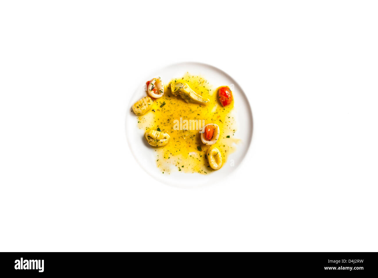 Gnocchi di Patate con Calamari e Carciofi - Kartoffel-Gnocchi mit Tintenfisch und Artischocken Stockfoto