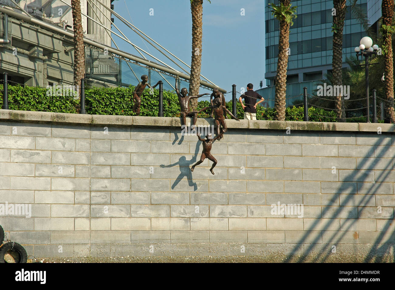 Skulptur am Ufer des Singapore River. Die erste Generation Stockfoto