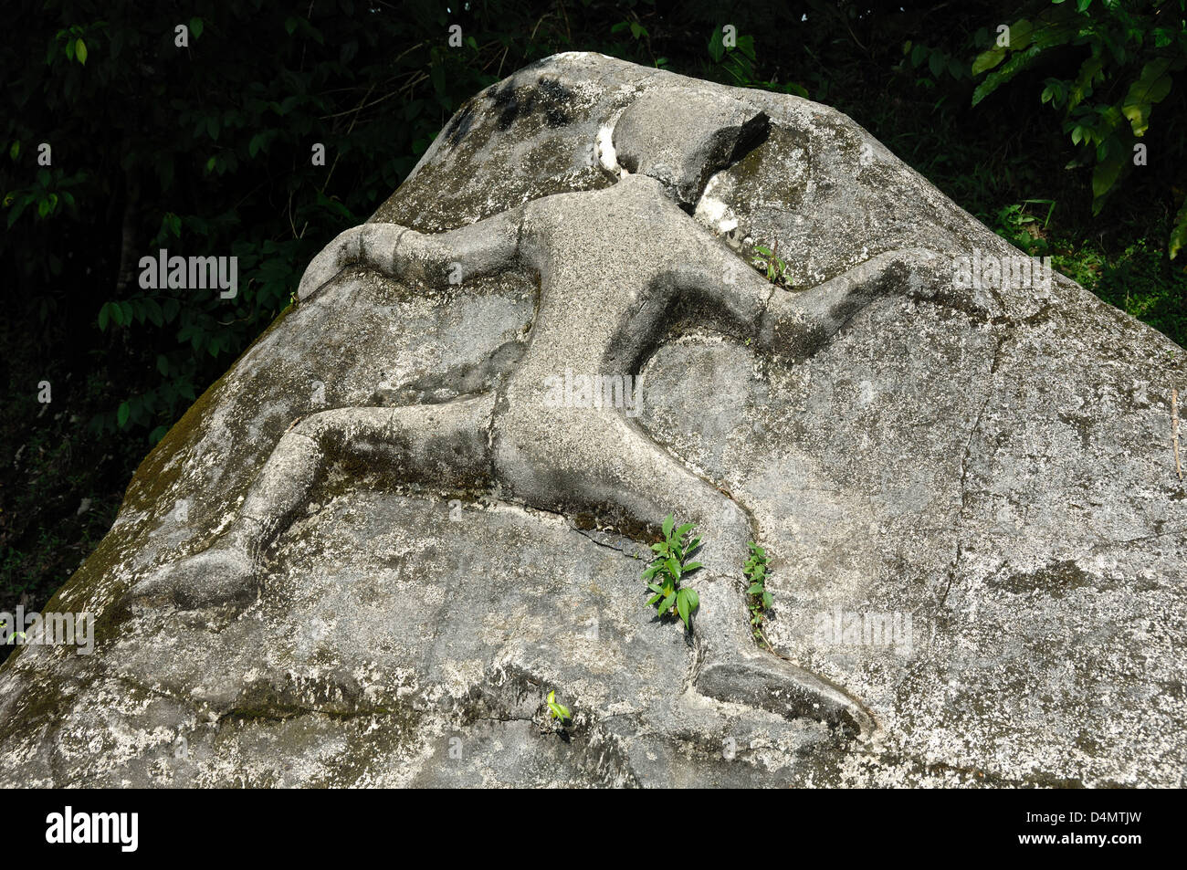 Uralte menschliche Figur Rock Carving c1000 AD von Santubong Sarawak Borneo Malaysia Stockfoto