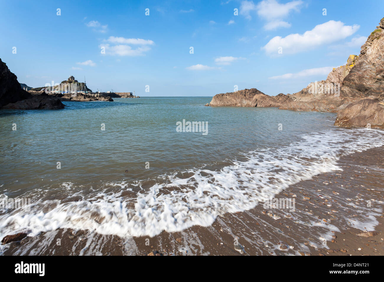 Wellen an Rapparee Cove Beach, Ilfracombe Devon England UK Stockfoto