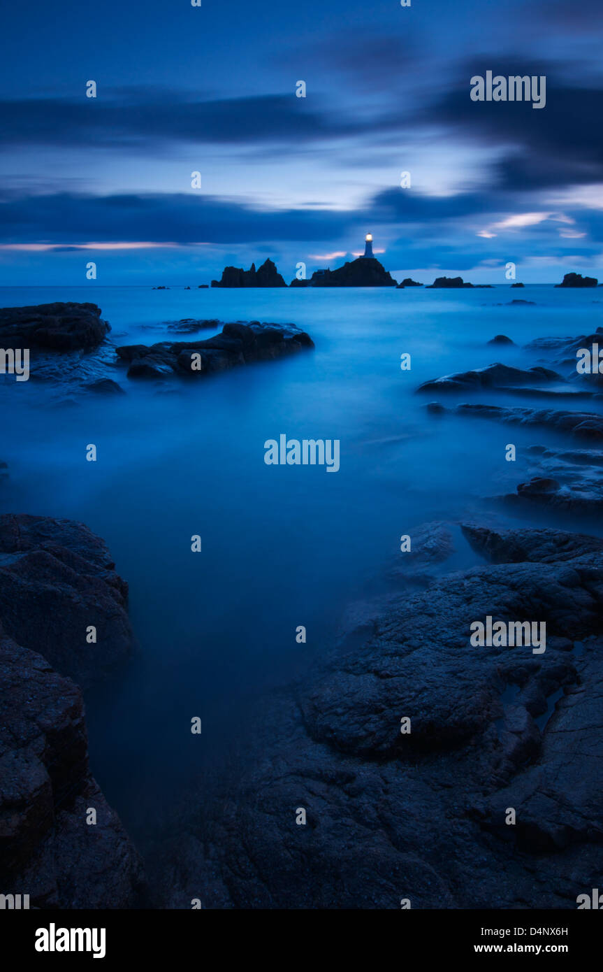 Winter Sonnenuntergang Bild Corbiere Leuchtturm in Jersey Channel Islands März 2013 Stockfoto