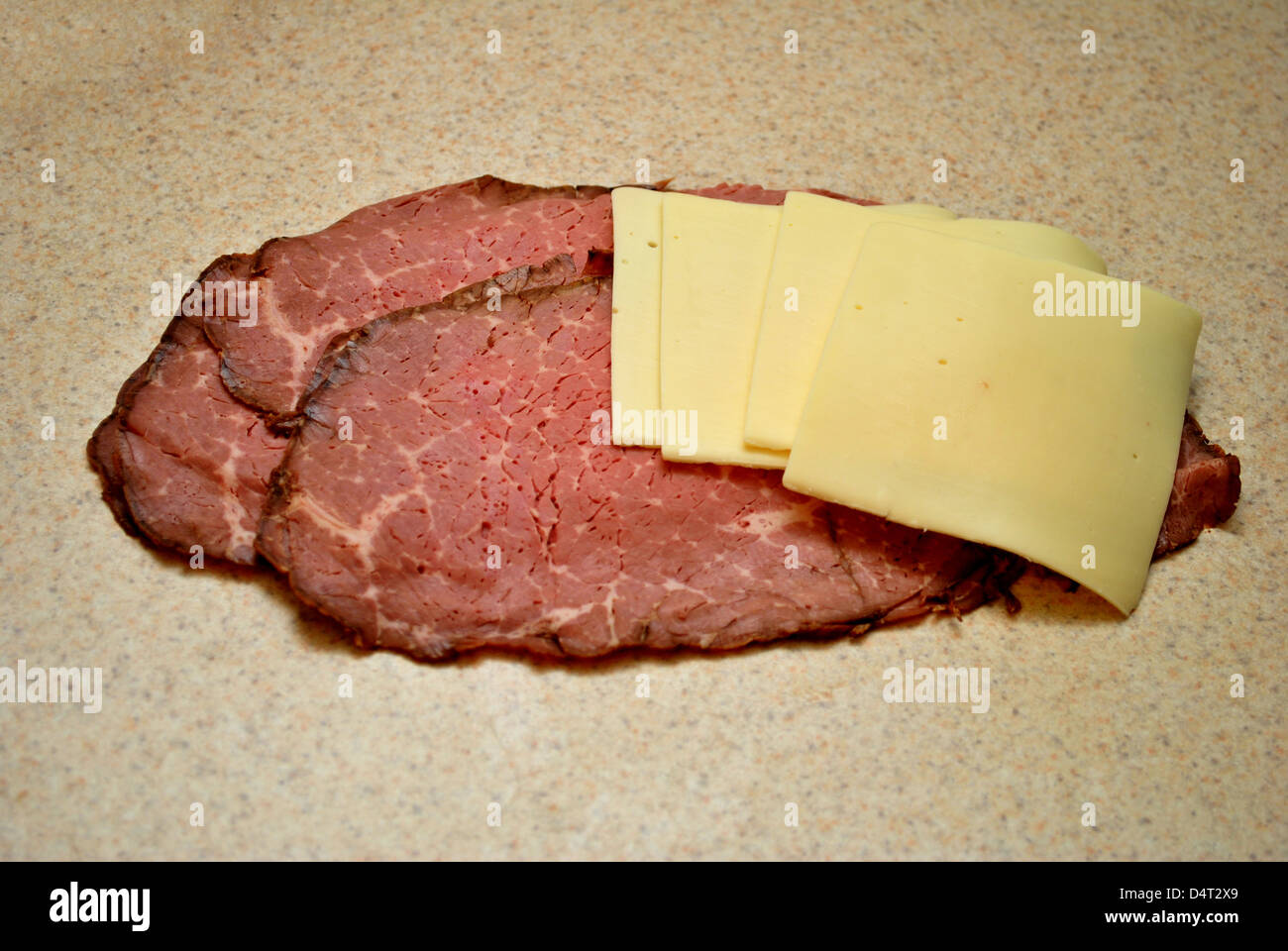 Käse und Fleischscheiben Stockfoto