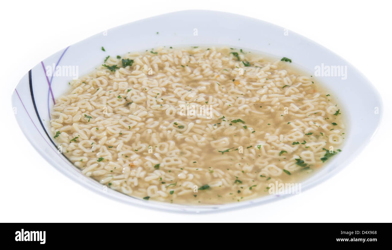 Frisch gemacht Buchstabensuppe mit Kräutern isoliert auf weißem Hintergrund Stockfoto