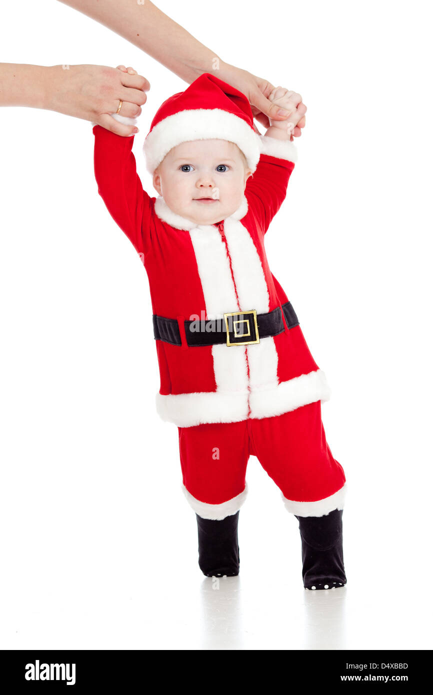 erste Schritte der lustigen Weihnachtsmann-baby Stockfoto