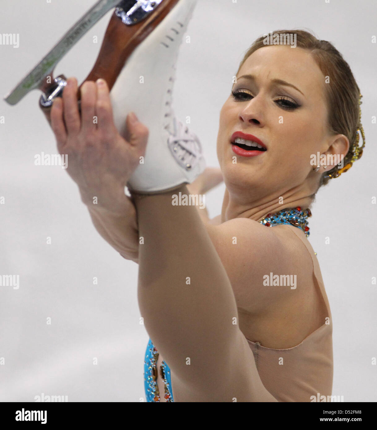 Joannie Rochette aus Kanada führt ihre Kür bei der Eiskunstlauf-Wettbewerb im Pacific Coliseum in Vancouver 2010 Olympischen Spiele in Vancouver, Kanada, 25. Februar 2010. Foto: Daniel Karmann Stockfoto