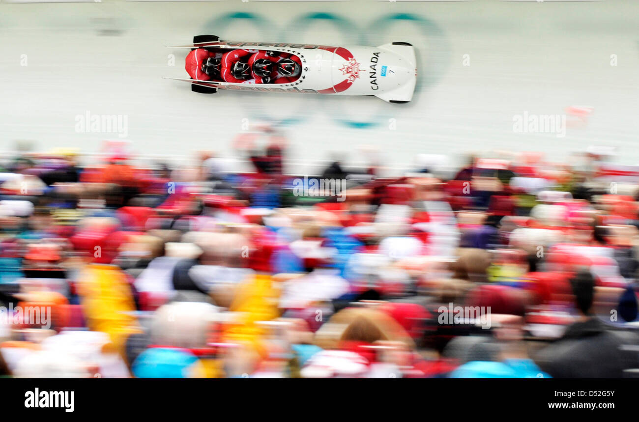 (von vorne nach hinten) Lyndon Rush, Chris Le Bihan, David Bissett und Lascelles Brown aus Kanada 1 Team in Aktion während Hitze 4 von der Männer Vierer-Bob-Wettbewerb im Whistler Sliding Center während der Olympiade Vancouver 2010 in Whistler, Kanada 27. Februar 2010. Foto: Peter Kneffel Stockfoto