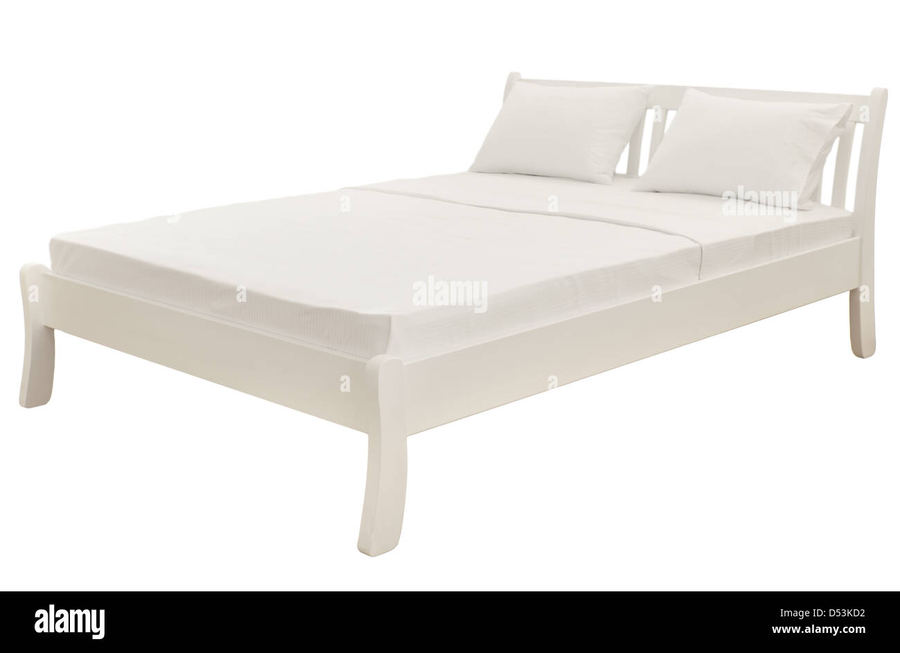 Weißes Bett, isoliert auf weiss Stockfoto