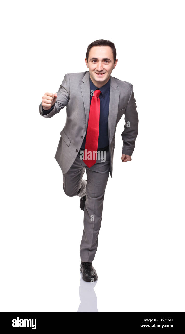 lächelnder Mann läuft isolierten auf weißen Hintergrund Stockfoto