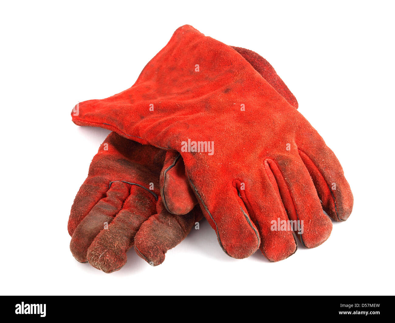 Zwei rote Handschuhe auf weißem Hintergrund... Die Handschuhe sind Schutzkleidung. Stockfoto