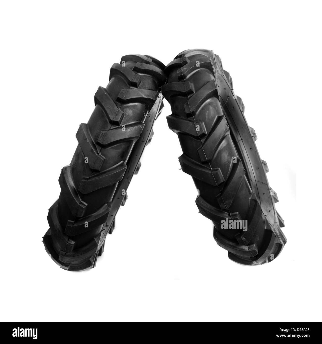 Neue, unbenutzte schwarze Grubber Reifen. Landwirtschaft und Landwirtschaft Hintergrundbild. Stockfoto