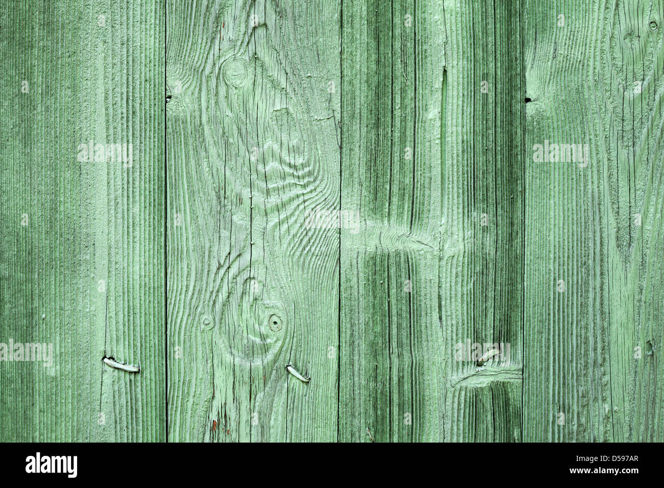 Alte grüne Holzwand Hintergrundtextur mit Nägeln Stockfoto