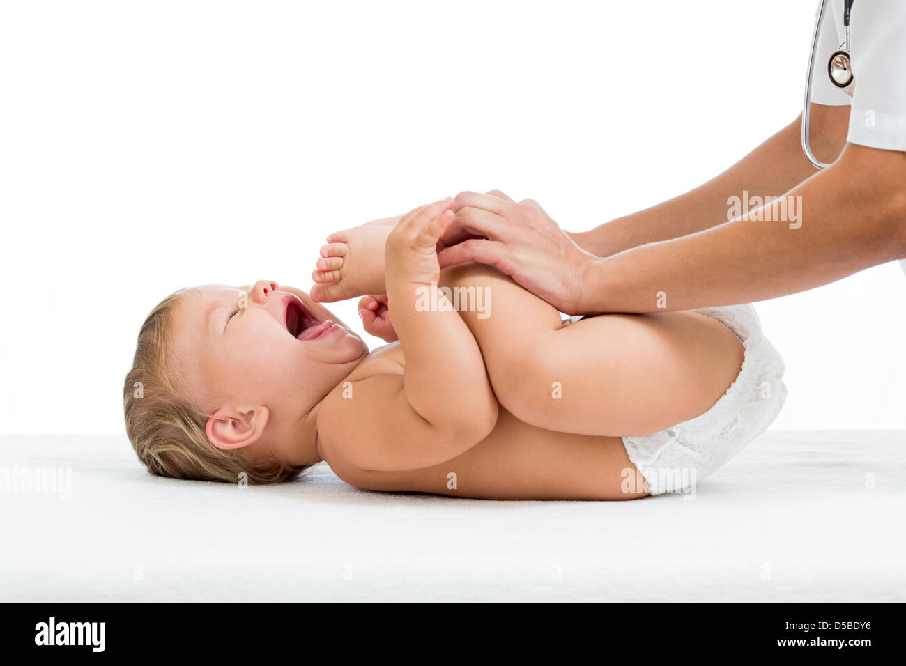 Arzt macht Gymnastik Babymädchen Stockfoto