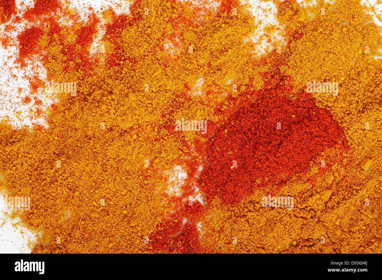 Paprika-Pulver und Currypulver Hintergrund Stockfoto