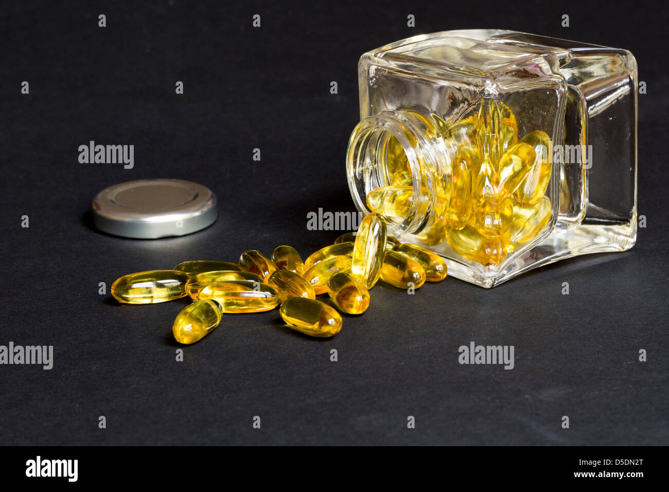 Glas von Dorsch Lebertran Pillen Stockfoto