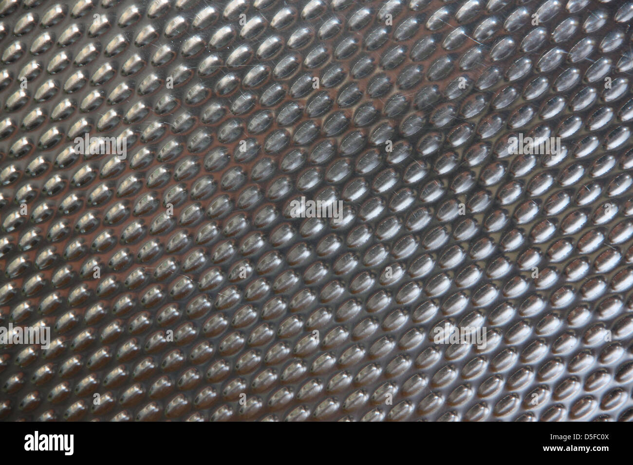 Die Aluminium-Textur nehmen an einen Stuhl. Stockfoto