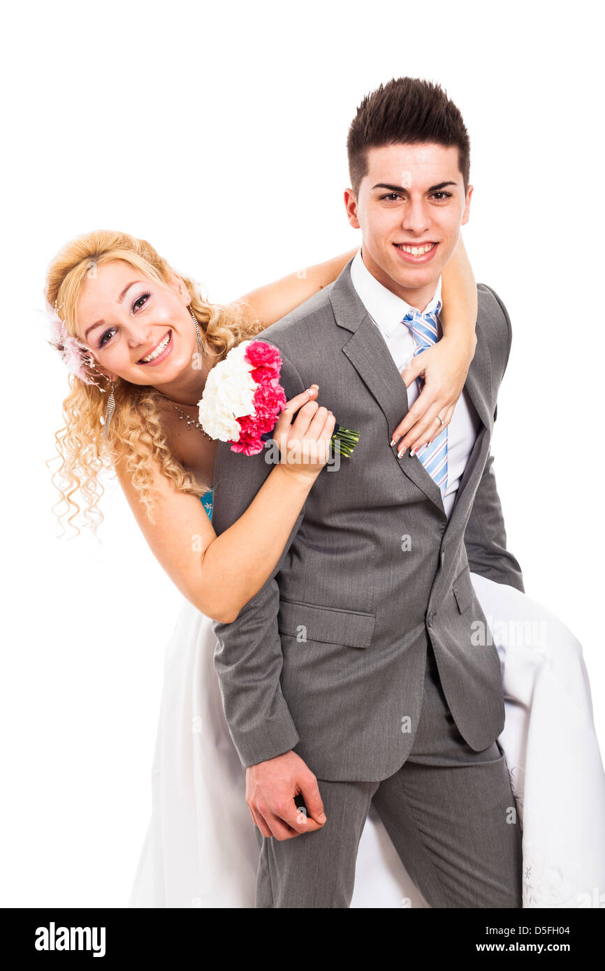 Glücklich frisch vermählte Brautpaar verliebt, isoliert auf weißem Hintergrund Stockfoto