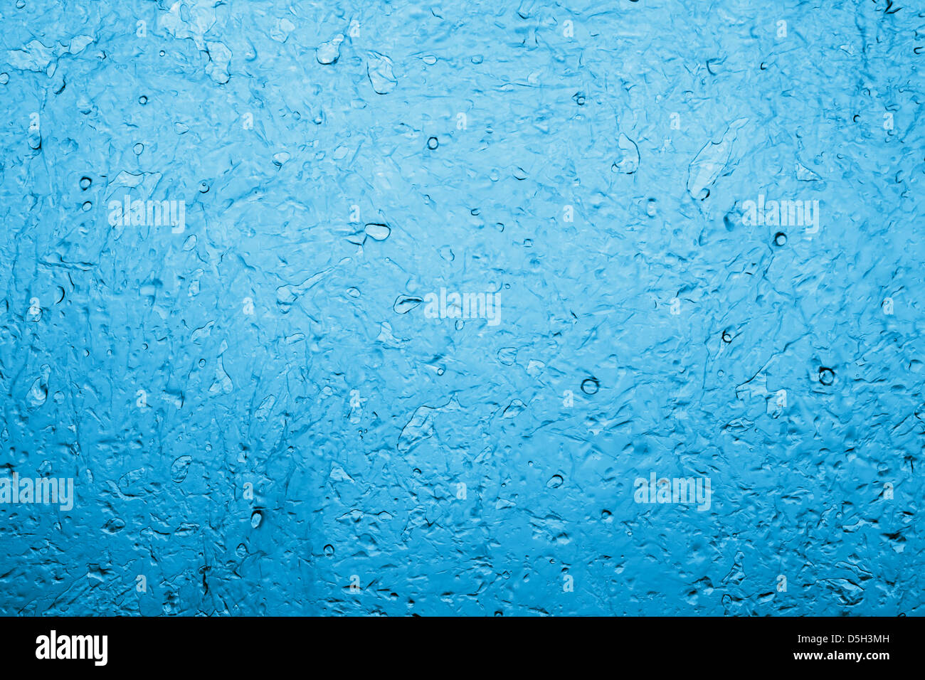 Wasser auf blaues Licht für Hintergrund Stockfoto