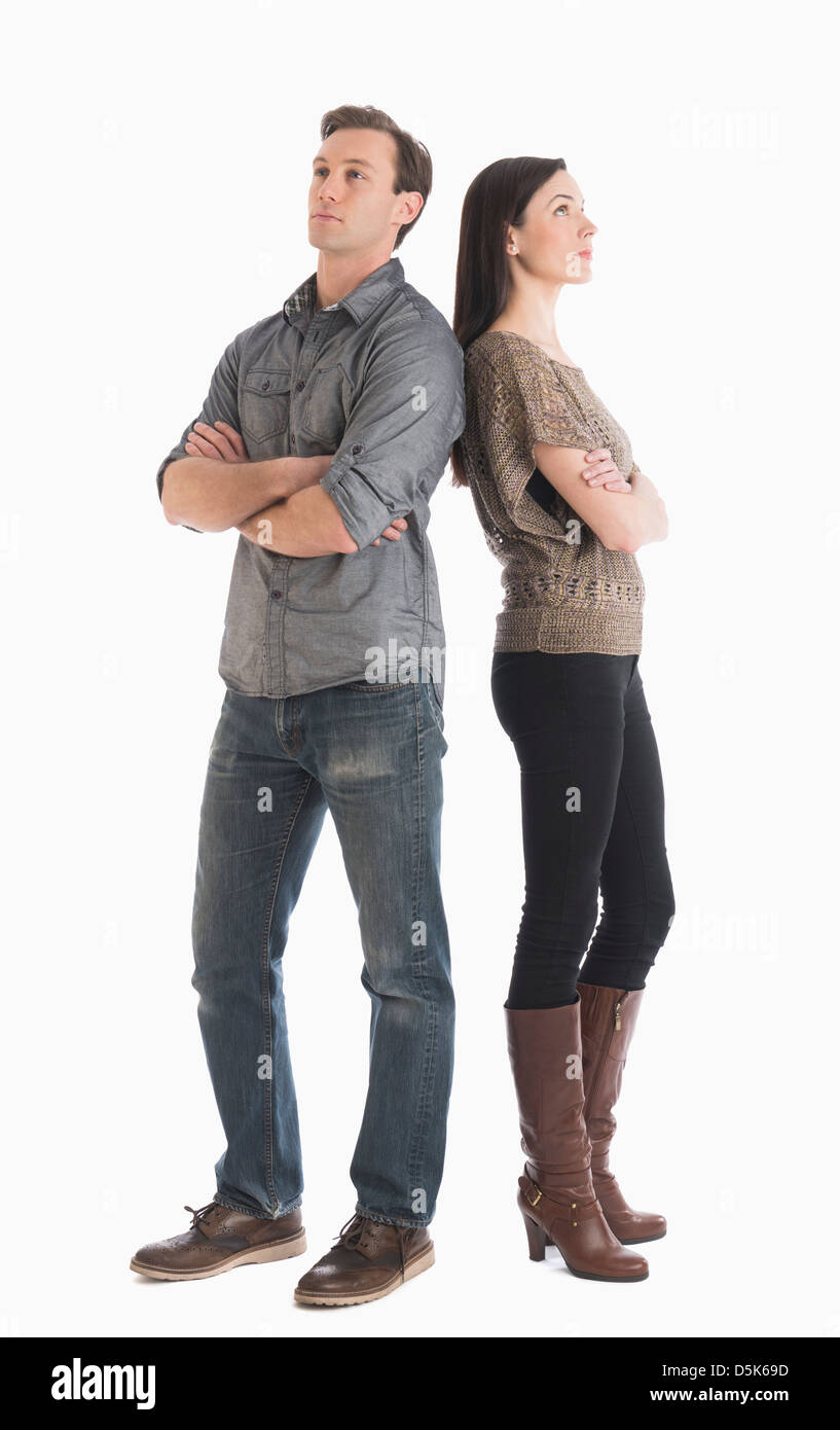 Paar stehen Rücken an Rücken Stockfoto