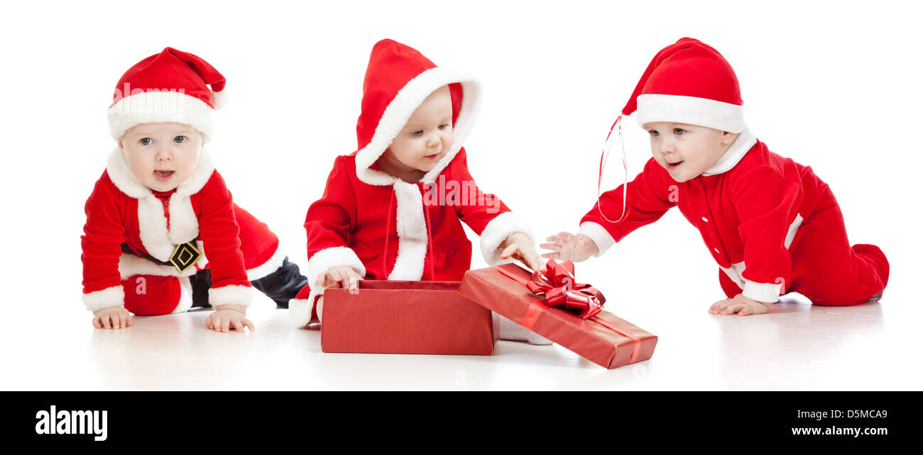 Weihnachten Weihnachtsmann Babys Jungen und Mädchen mit Geschenk-box Stockfoto