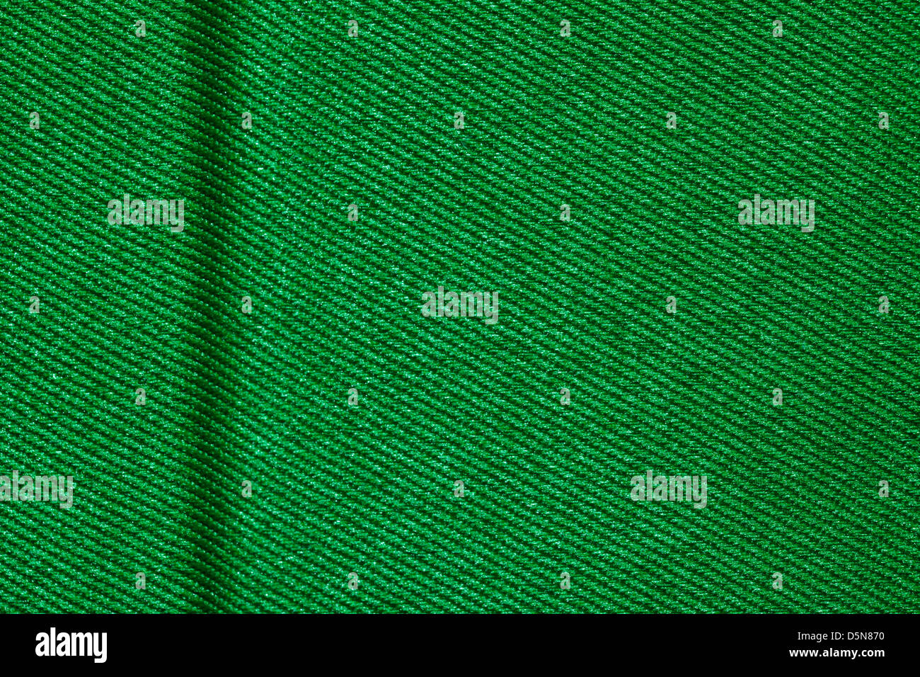 grüne Leinwand Hintergrund mit Marge auf linke Seite oder gewebte Textile Textur Stockfoto