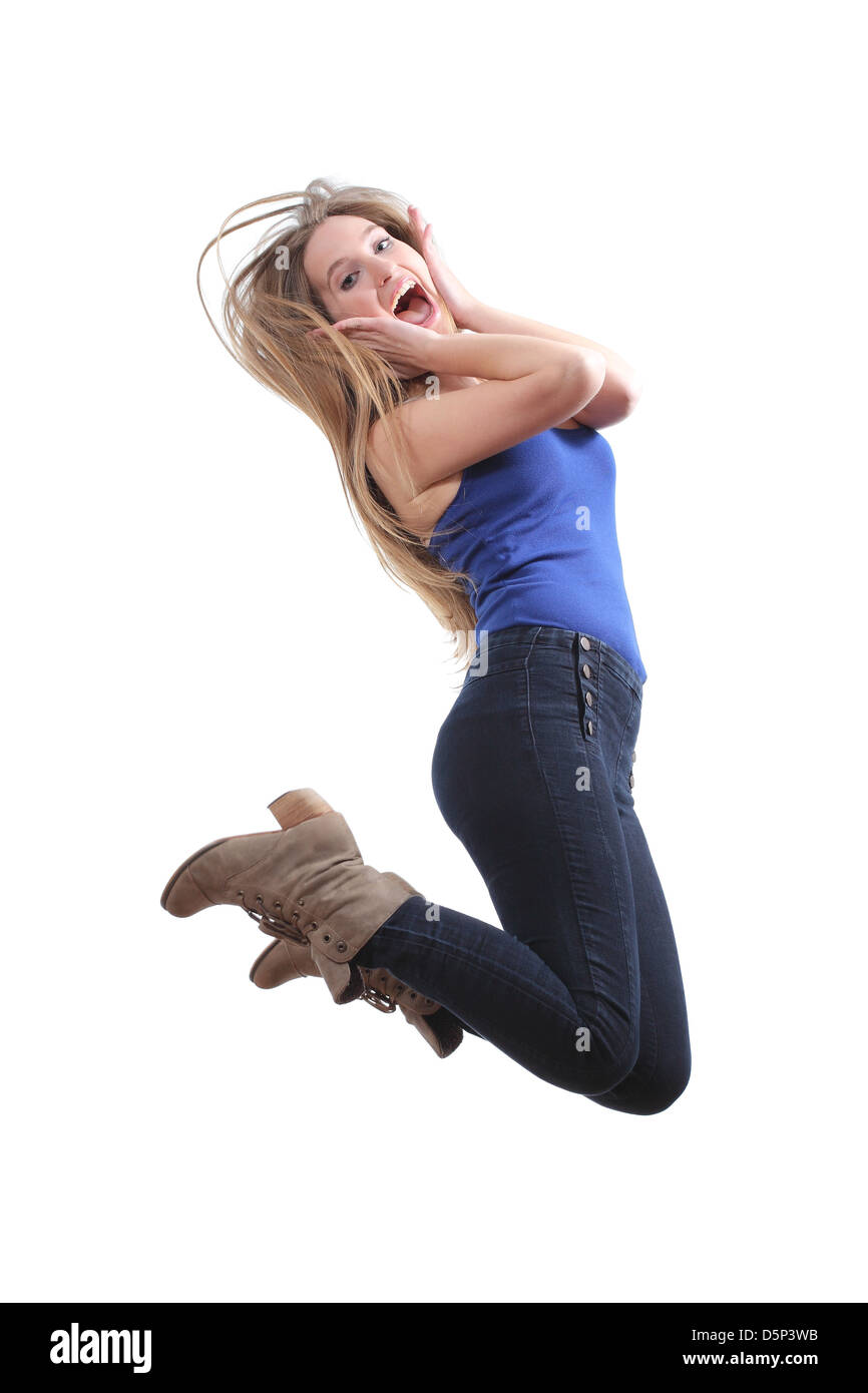 Blonde Teenager springen glücklich isoliert auf weißem Hintergrund Stockfoto