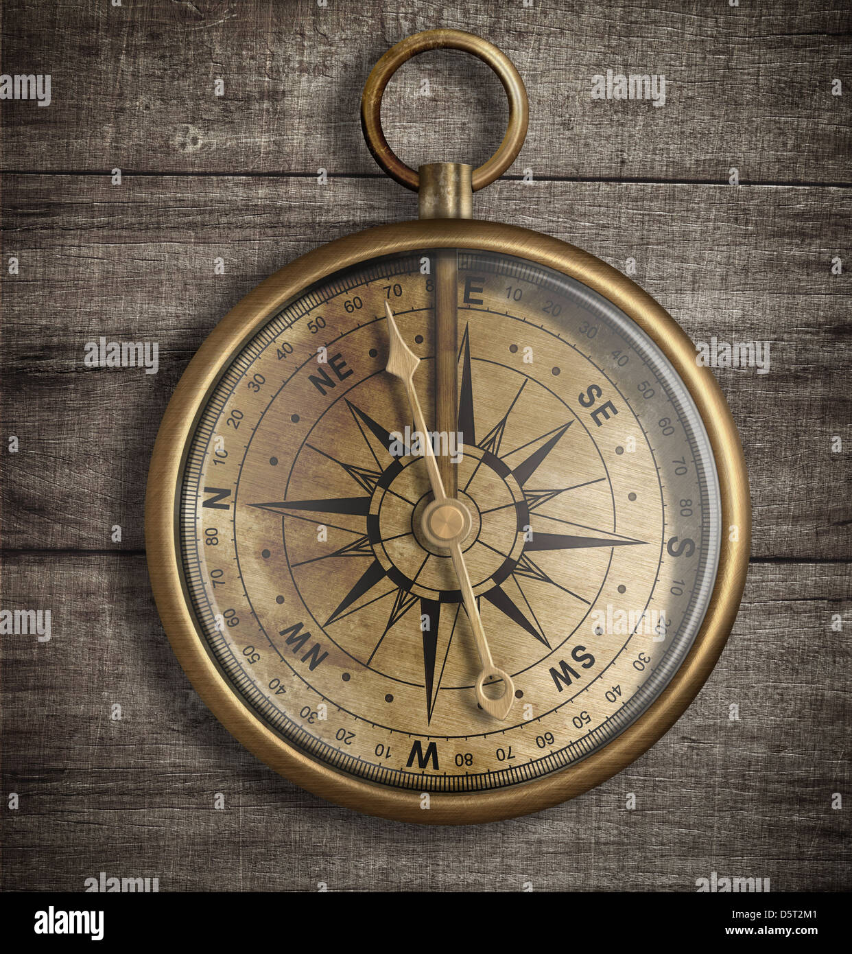 alte Messing-Kompass auf Holz Tischplatte Ansicht Stockfoto