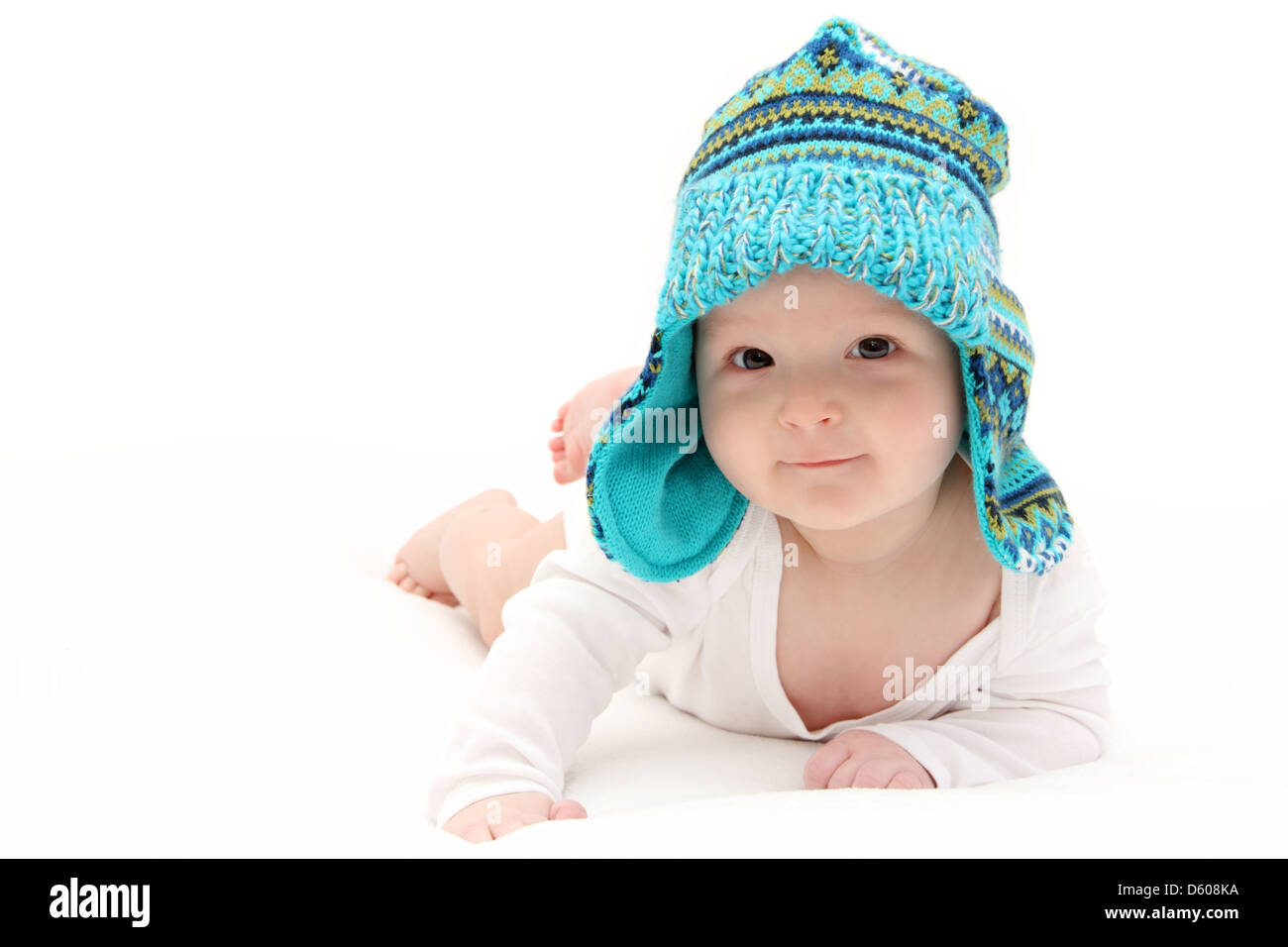 glückliches Baby auf Magen Stockfoto