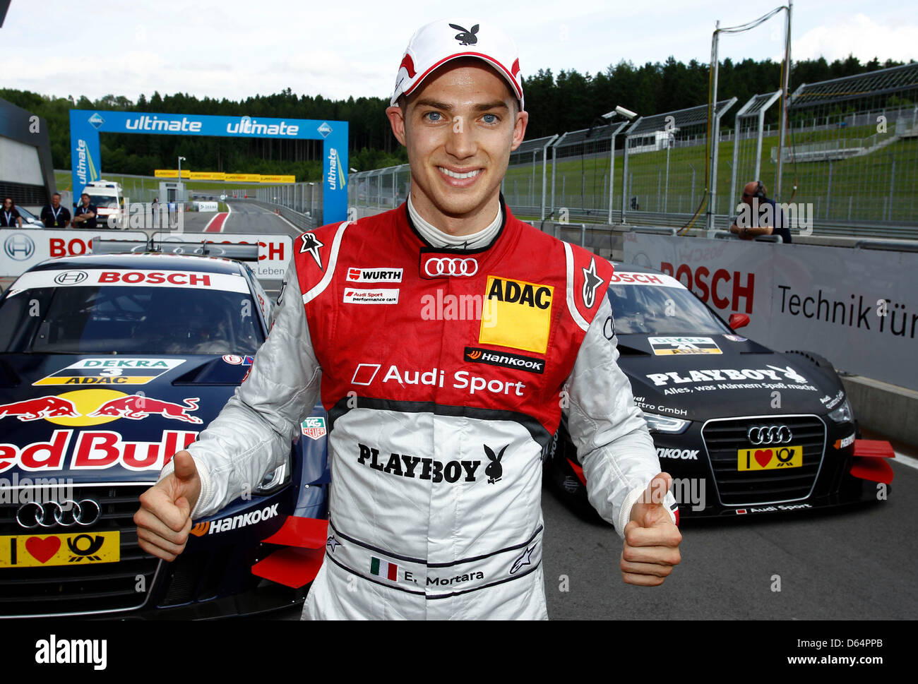 HANDOUT - ein Handout Bild datiert 2. Juni 2012 zeigt italienische Audi pilot Edoardo Mortara jubeln nach qualifiziert für die Poleposition beim vierten Rennen der Deutschen Tourenwagen Meisterschaft (DTM) in Spielberg, Österreich. Foto: Jürgen Hahn / redaktionelle Nutzung nur Stockfoto