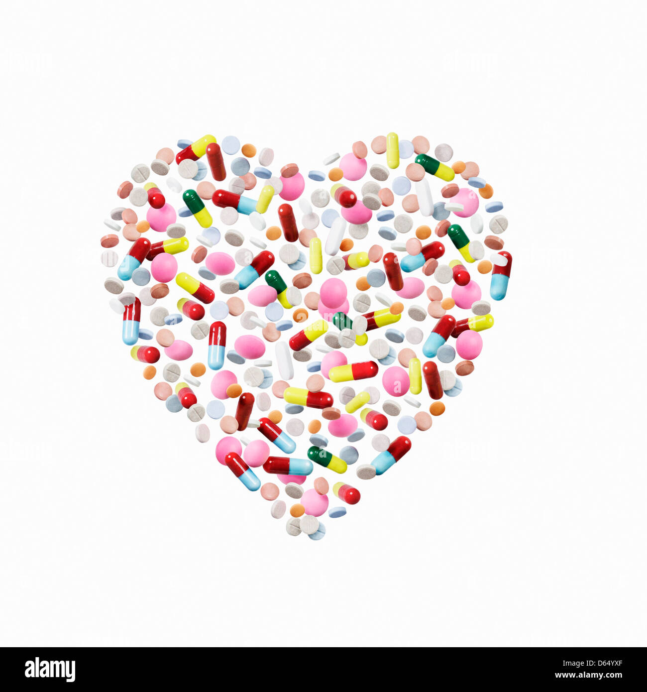 Pillen und Kapseln in Herzform Stockfoto
