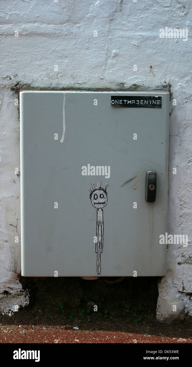 Graffiti-Stick Mann Power Box weiße Ziegel macht Stockfoto