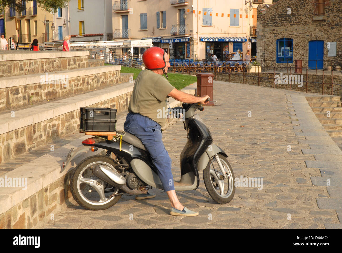 Moped-Mann Stockfoto
