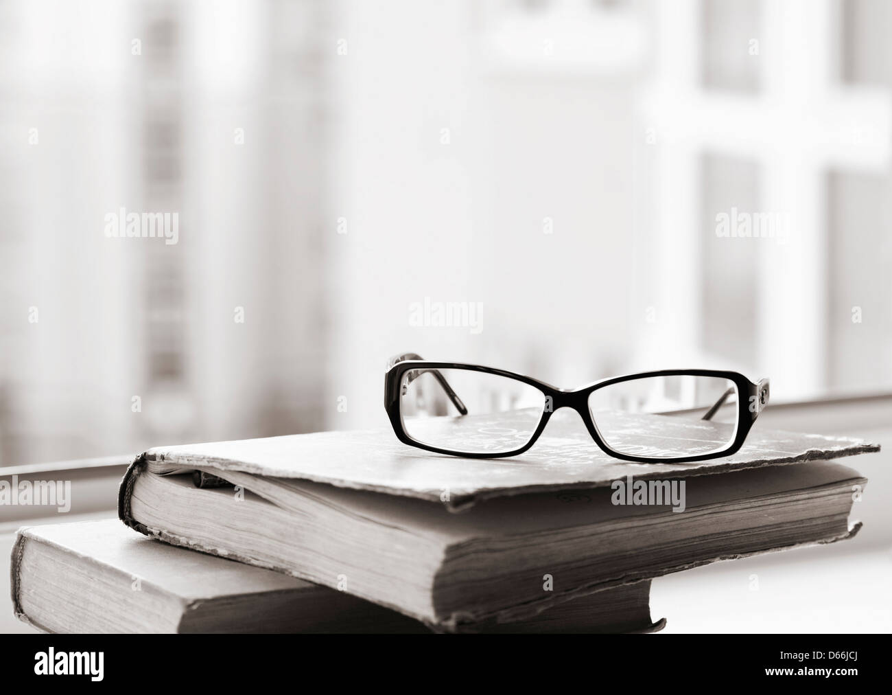 alte Bücher und die Gläser Stockfoto