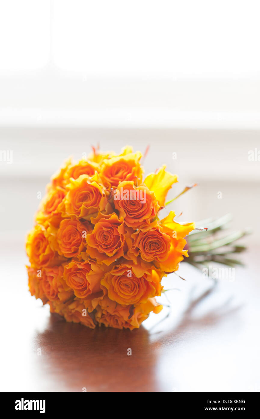 Orange Rosen Hochzeit Blumenstrauß Stockfoto