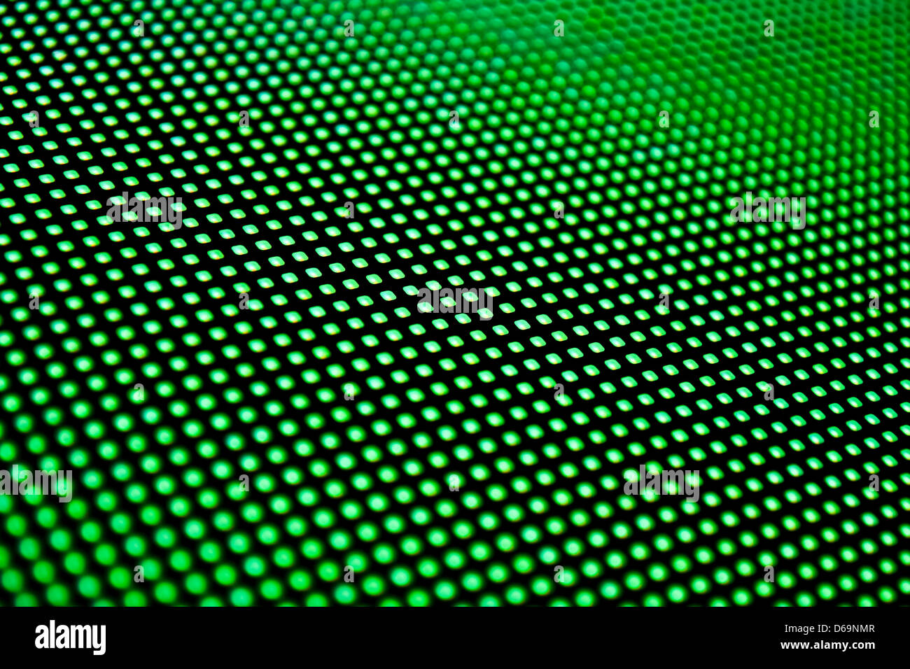 Eine Matrix aus LEDs leuchten grün. Geringe Schärfentiefe für einen verschwommenen Effekt. Stockfoto