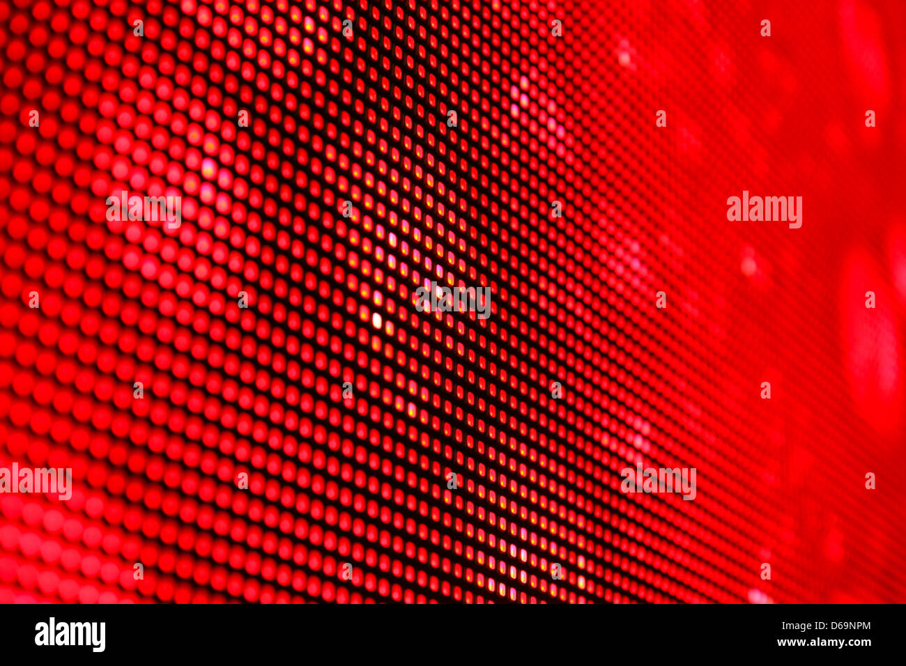 LED Matrix Hintergrund von roter Farbe. Geringe Schärfentiefe für einen verschwommenen Effekt. Stockfoto