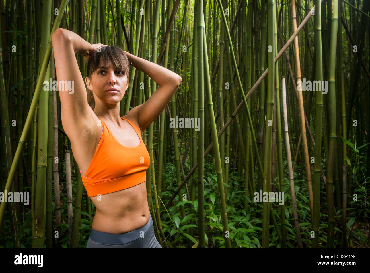 Läufer im Bambuswald Stockfoto