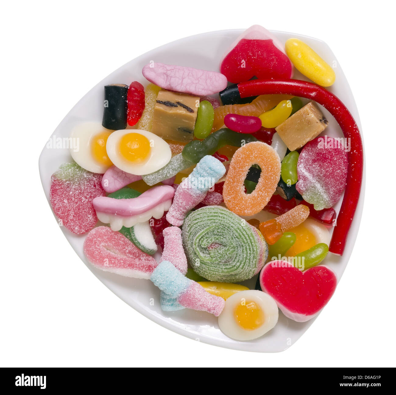 Gelatine-Süßigkeiten auf einem weißen Teller isoliert Stockfoto