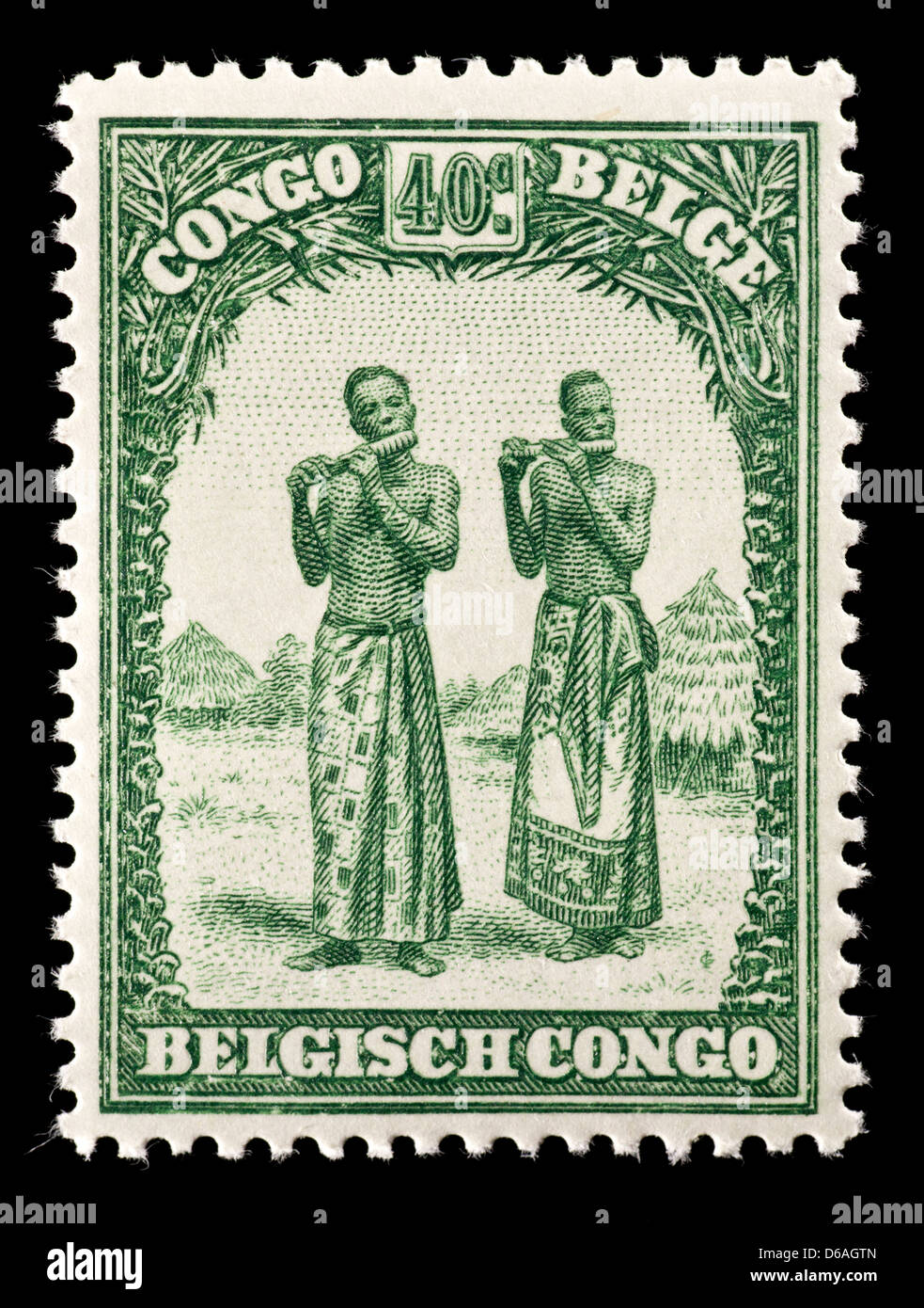 Briefmarke aus dem belgischen Kongo Darstellung einheimischen Männer, die Instrumente spielen. Stockfoto
