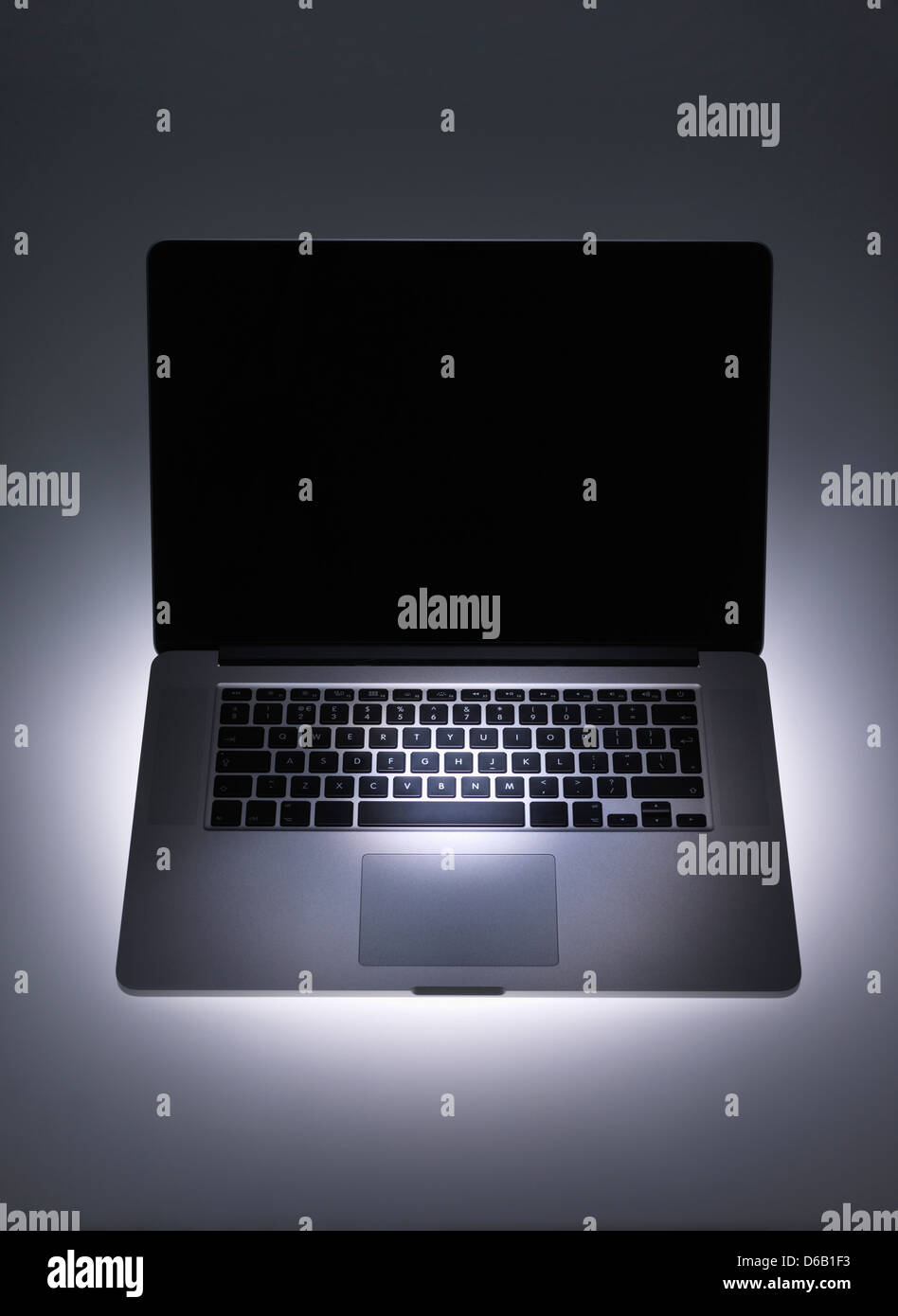 Spotlight auf Laptop-computer Stockfoto