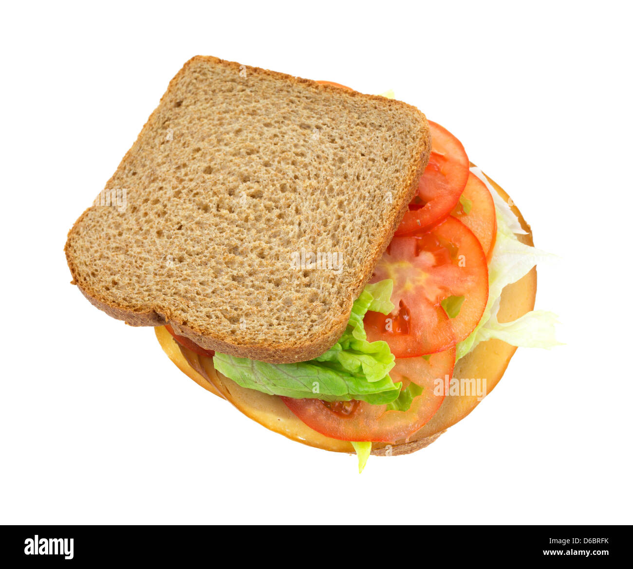 Ein Sandwich aus Vollkornbrot mit Salat, Tomaten und Tofu fleischlose Türkei auf einem weißen Hintergrund. Stockfoto