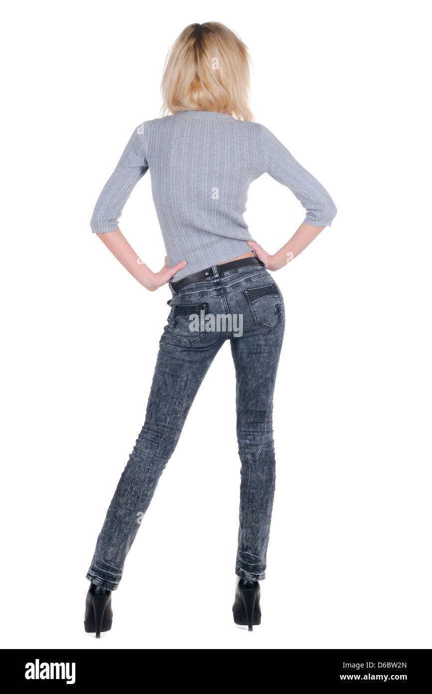 Mode große junge Frau. Hübsches Mädchen in grauen Pullover und Jeans. Hinten  Sie Ansicht von. Isoliert auf weißem Hintergrund. Heckansicht des Menschen  Stockfotografie - Alamy